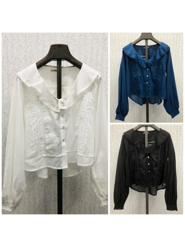 Camisa escote de pico con vuelo