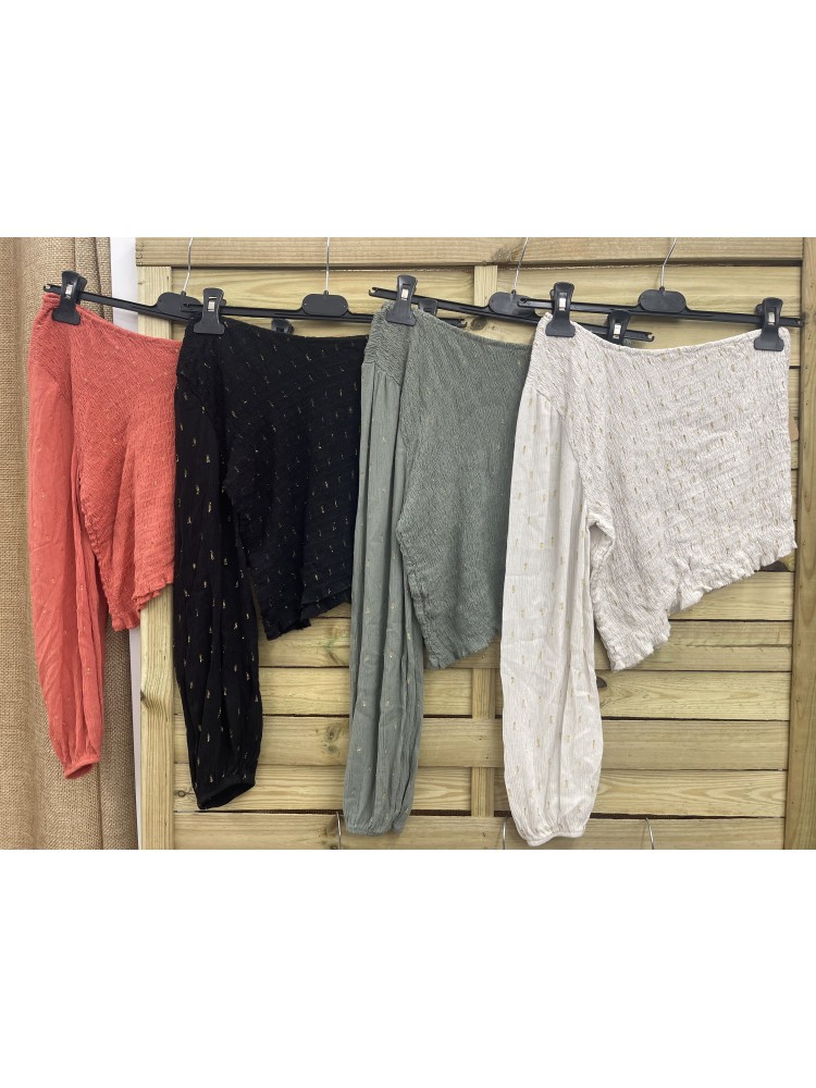 Falda/pantalon volantitos con pintas doradas