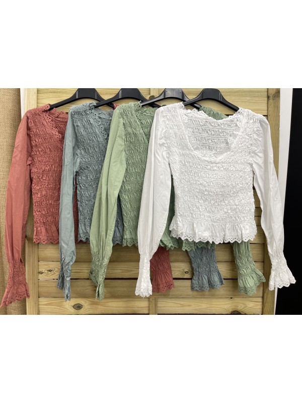 camisa fruncida con puntilla