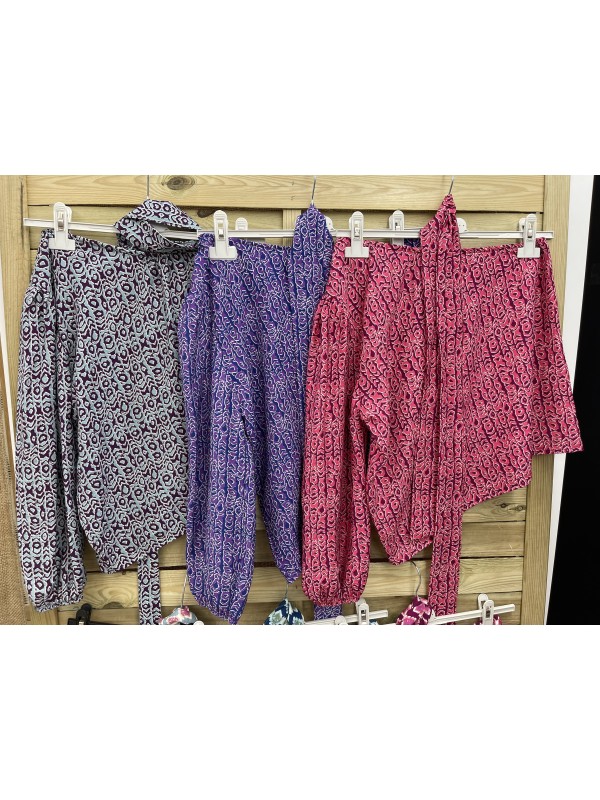 Camisa asimétrica con lazo estampado geométrico