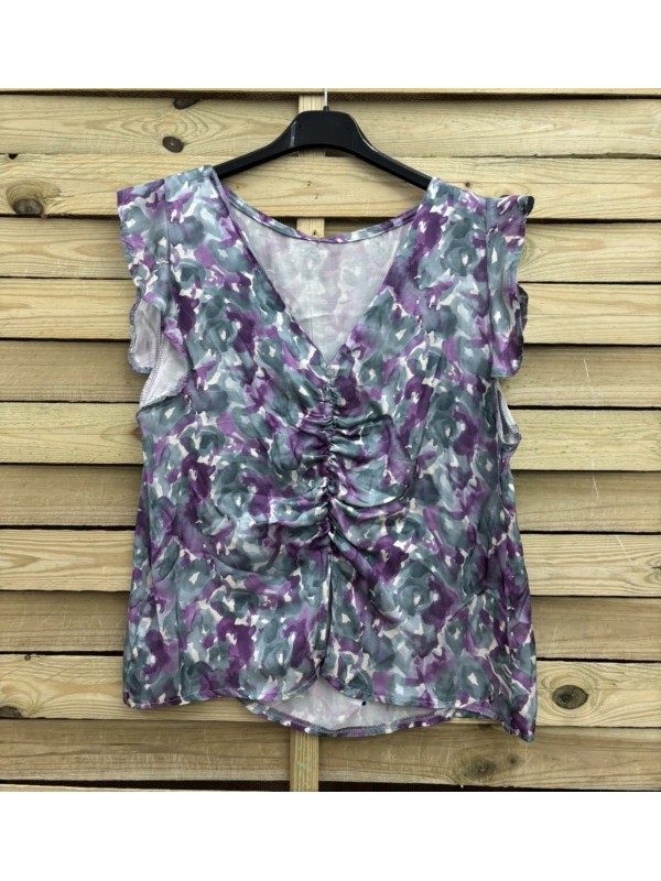 Camisa manchas bicolor con fondo blanco