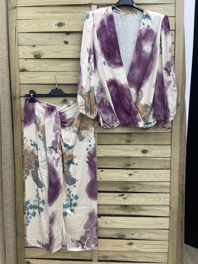 Conjunto de blusa y falda con nudo