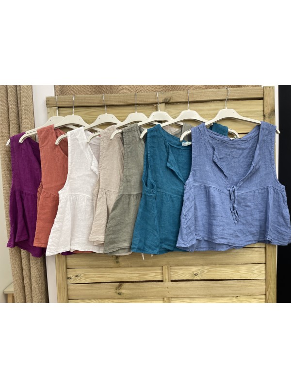 Chaleco de lino con lazo y volantito