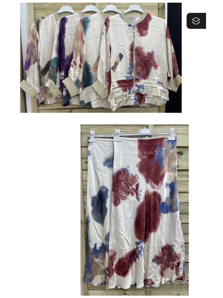 Falda satinada con borde puntilla manchas