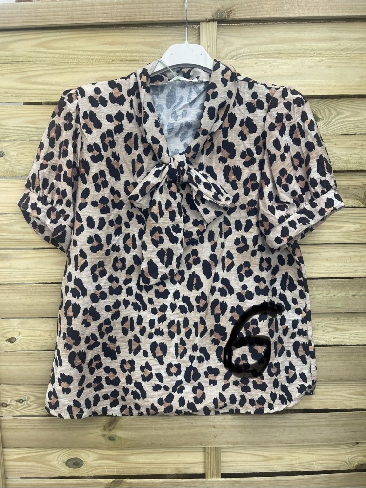 Camisa estampada lazo de manga corta