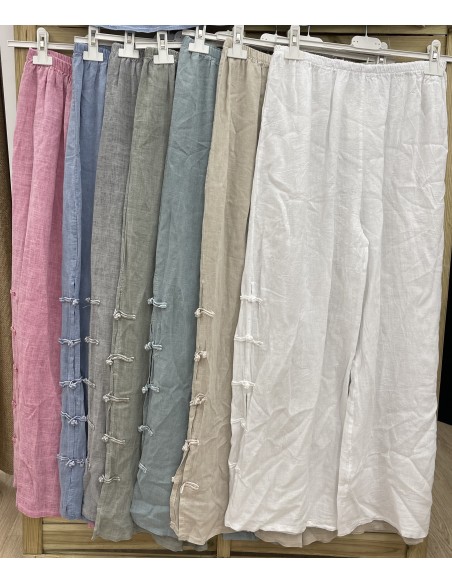 Pantalon lino con botones de nudos laterales