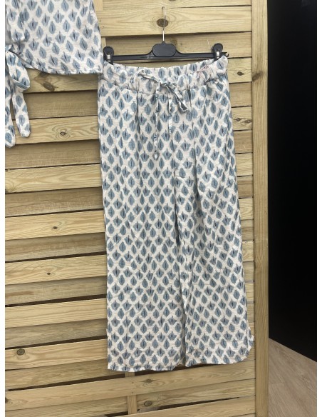 Pantalón pesquero rajas laterales rombos difuminados