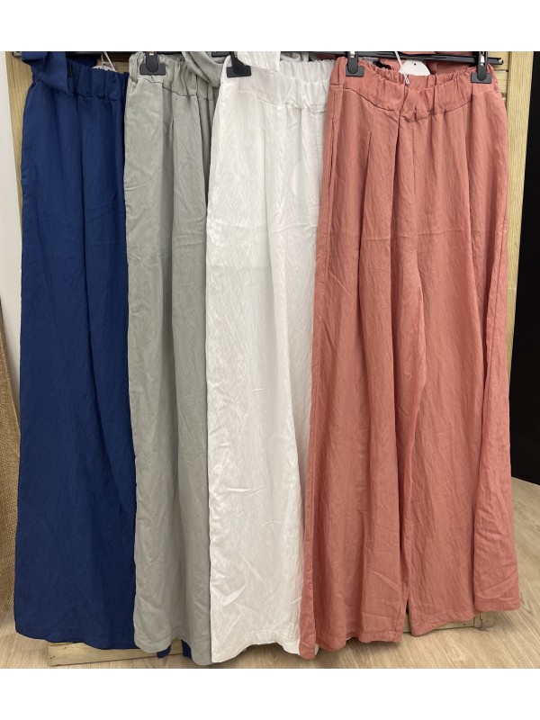 Pantalon liso cintura ancha y bolsillos