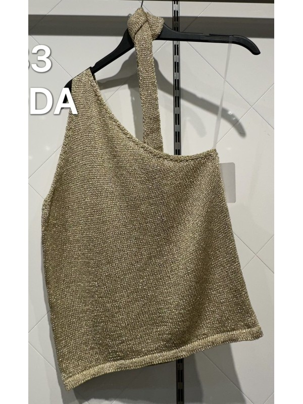 Top asimétrico dorado con lazo