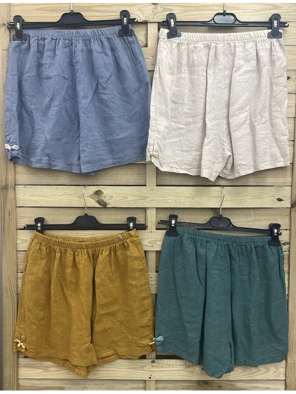 Short de lino con botón lateral de cordón