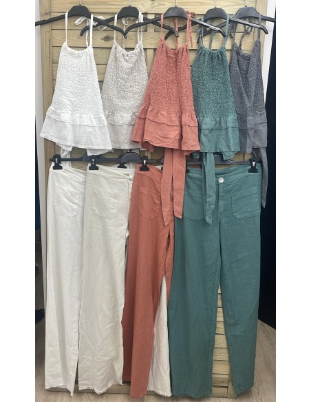 Pantalón de lino con bolsillos delanteros y bajo desflecado